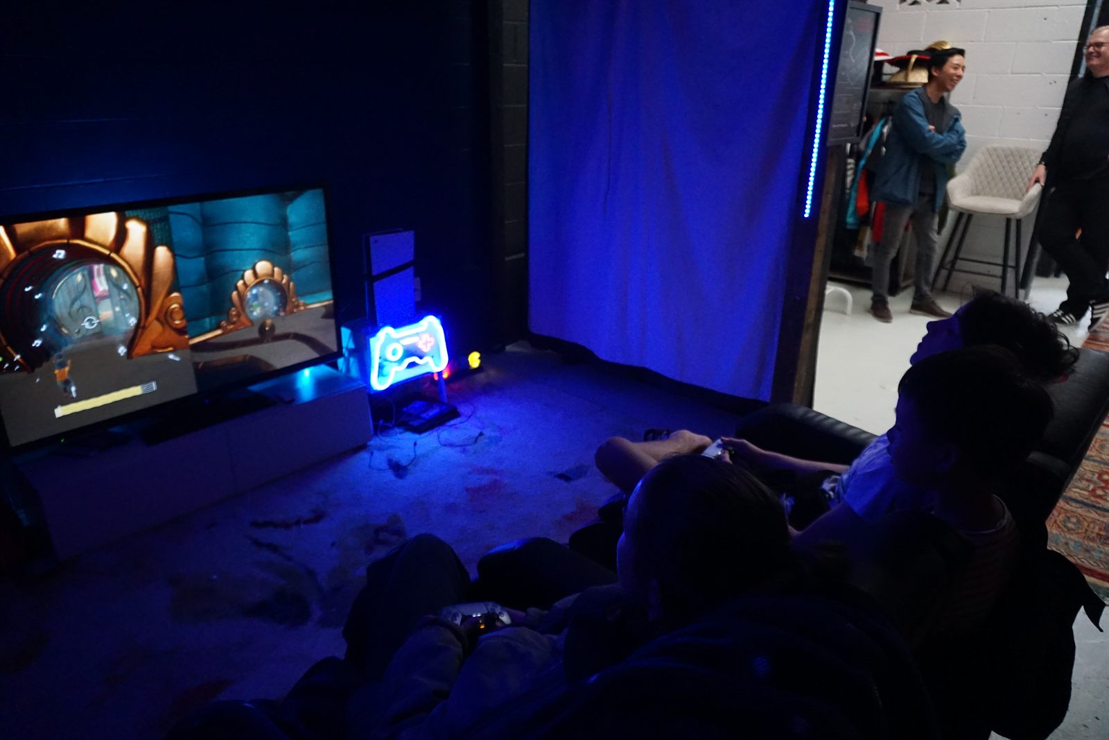 Kids gaming lounge with blue neon at Node Space