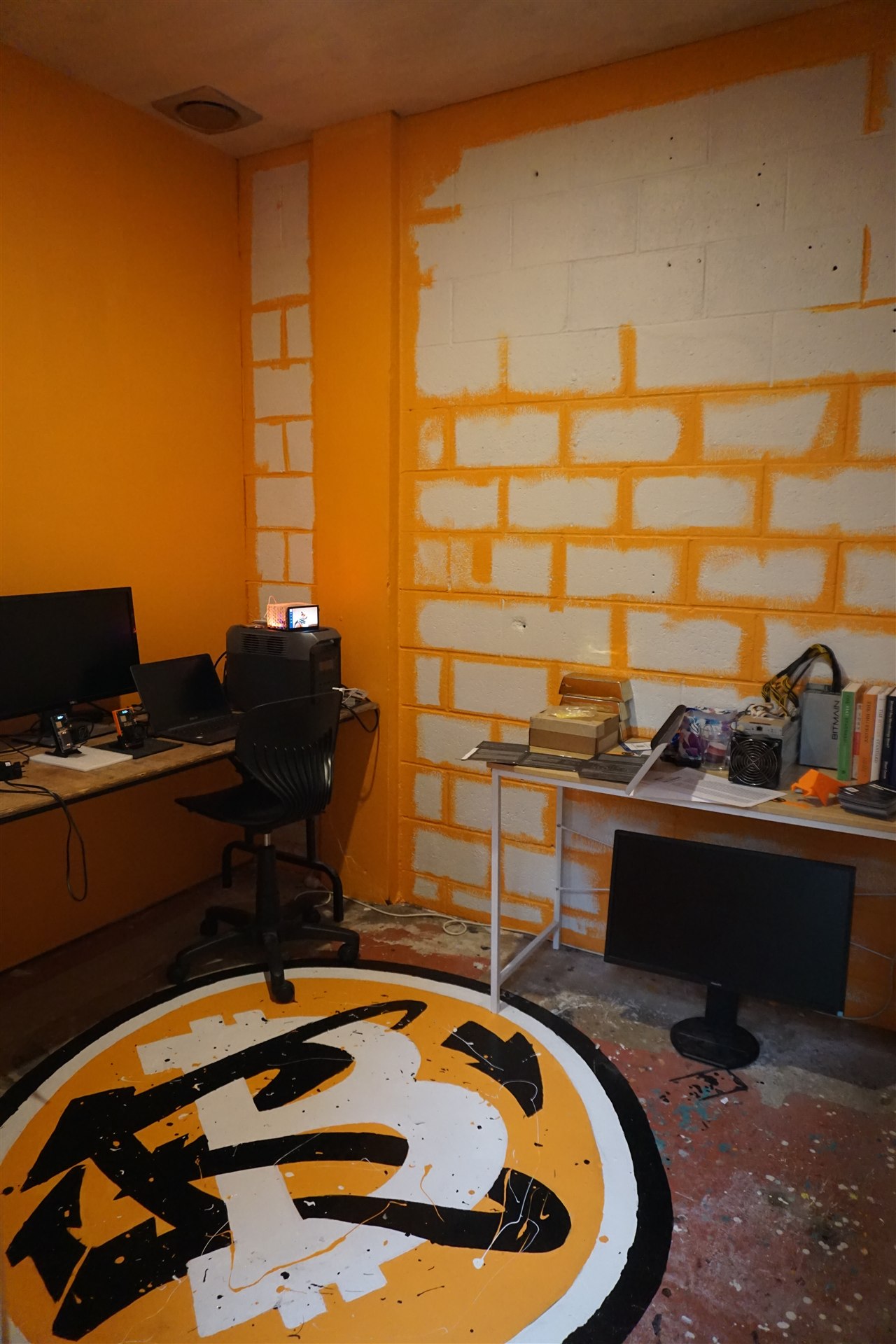 Bitcoin room with floor mural and desks inside Node Space Devonport